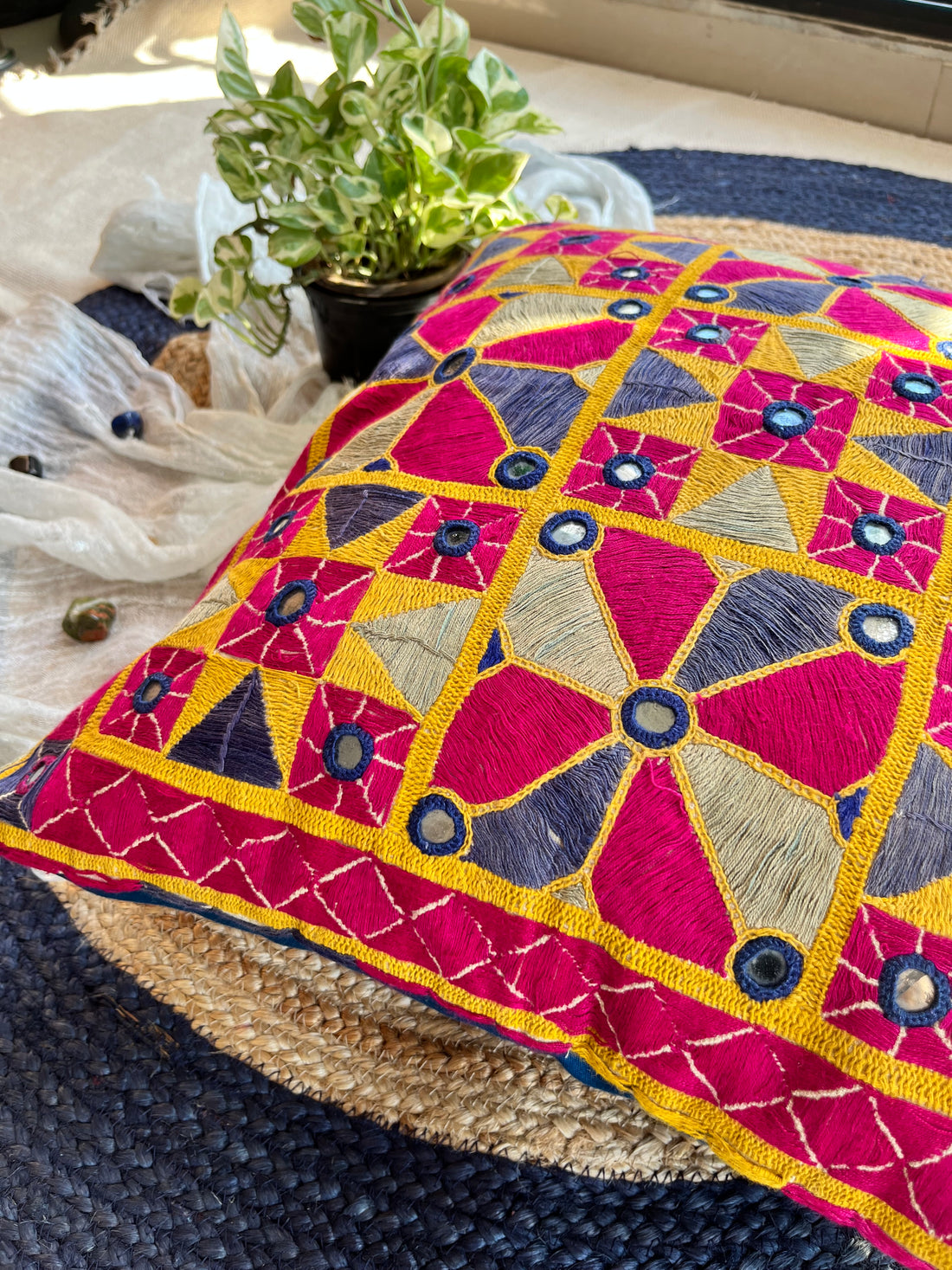 "BHADRA Vintage Kutch Embroidery Cushion Cover, 18x18 inches, featuring intricate traditional Kutch embroidery in vibrant colors, showcasing floral and geometric patterns on a soft fabric background."