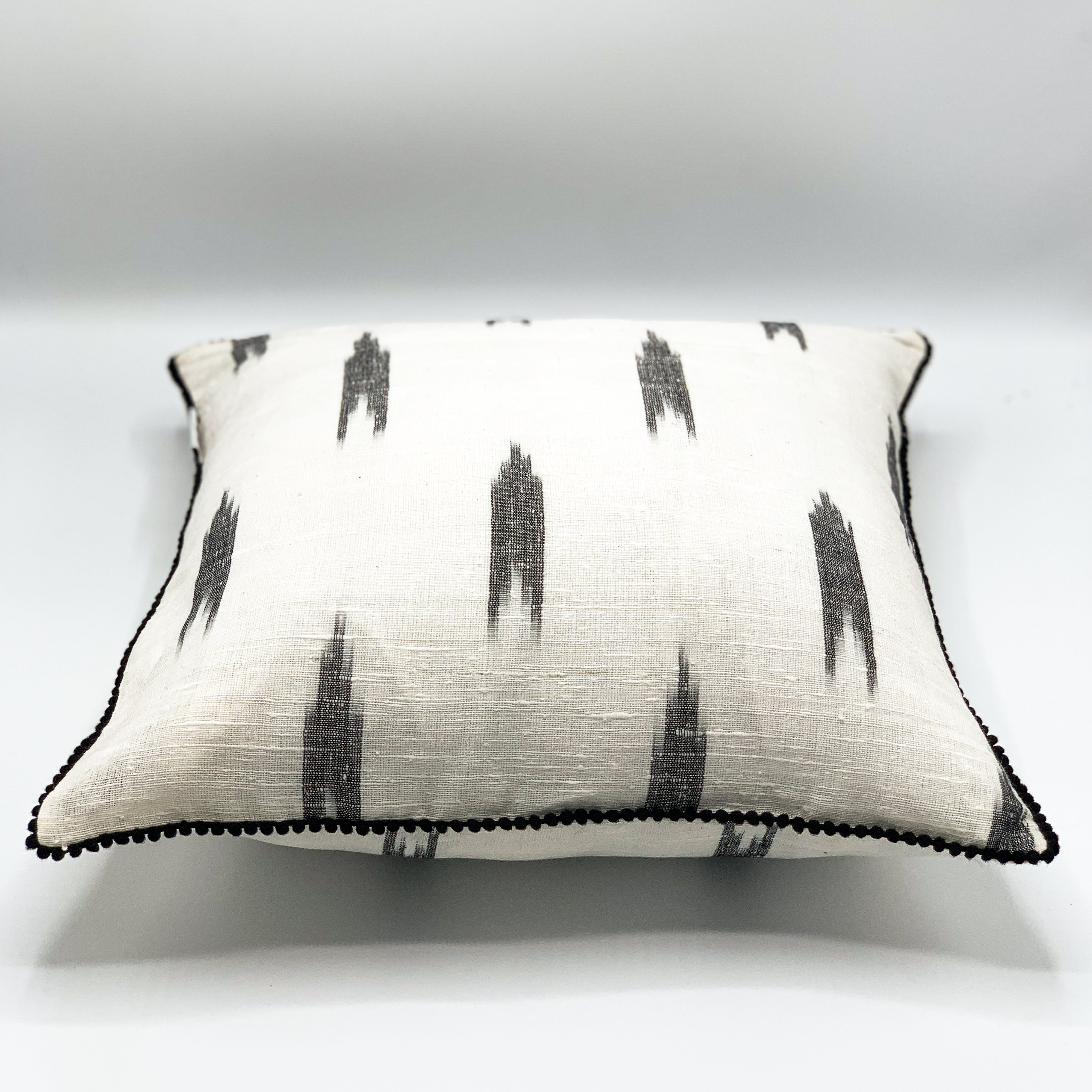 &quot;VAAN Jute Cotton Ikat Cushion Cover available in 16x16 and 18x18 sizes, featuring a vibrant ikat pattern with a blend of jute and cotton fabric, perfect for adding a touch of bohemian charm to any living space.&quot;