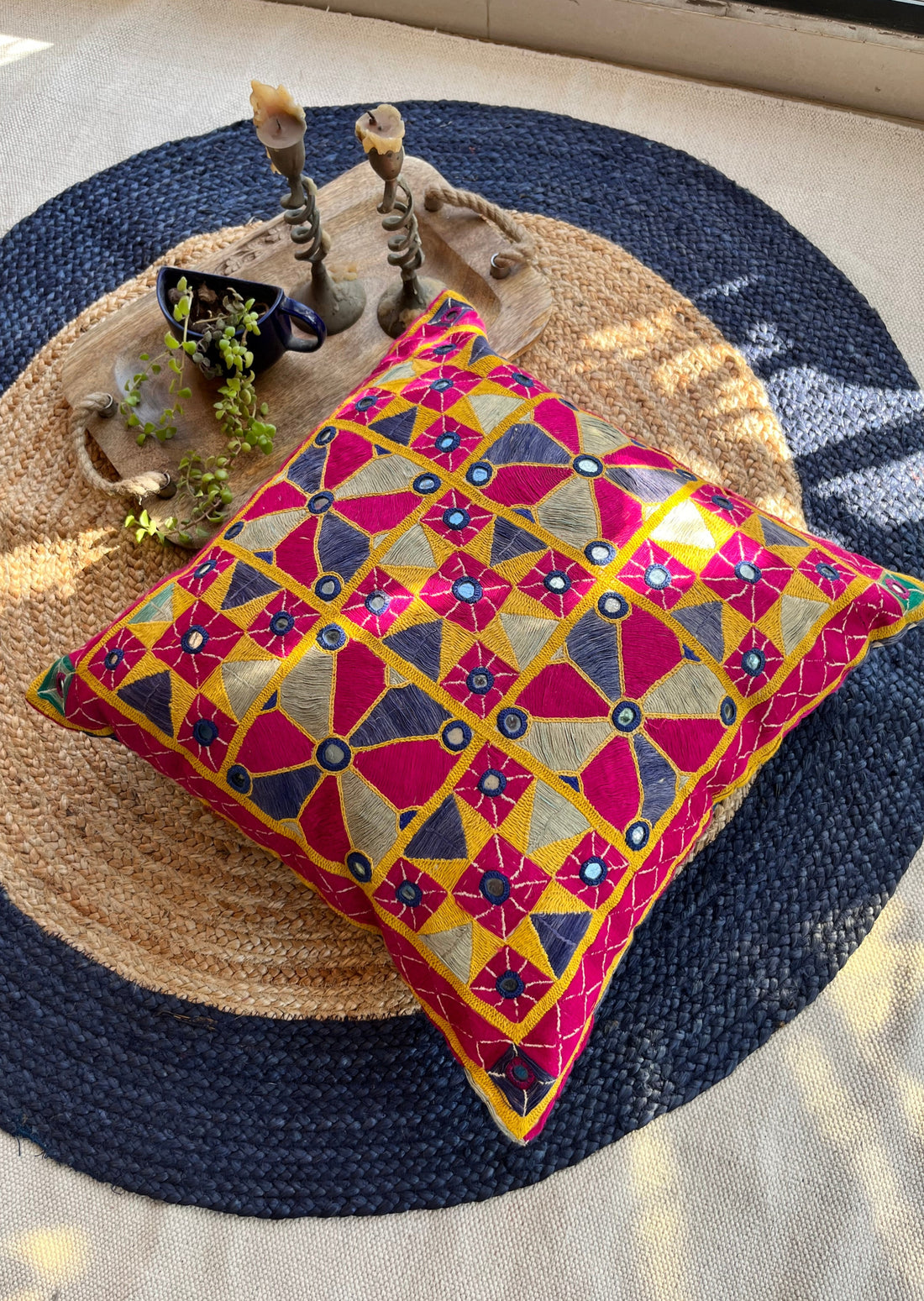 "BHADRA Vintage Kutch Embroidery Cushion Cover, 18x18 inches, featuring intricate traditional Kutch embroidery in vibrant colors, showcasing floral and geometric patterns on a soft fabric background."